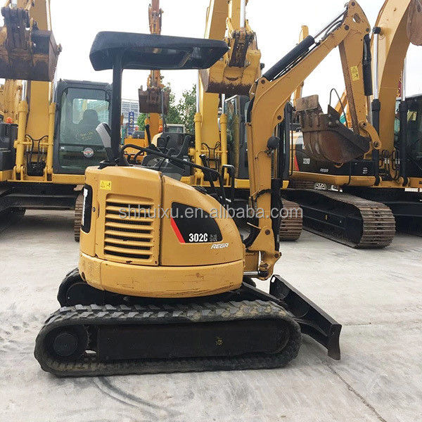Dobrą jakość Stosowany mały grabarz CAT302 Stosowany hydrauliczny mini koparz maszyna gąsienicowa Gąsienicka w magazynie