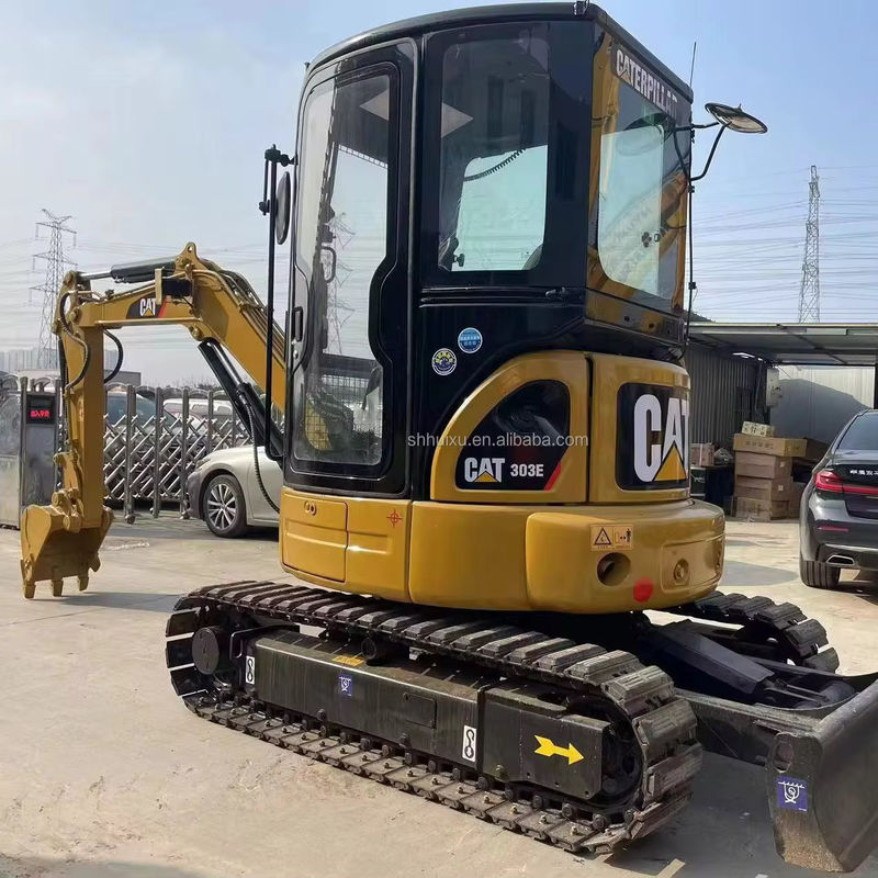 mini używany bagator żółtego koloru cat303e na sprzedaż